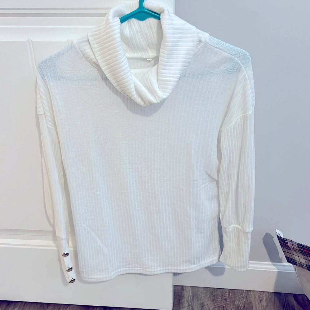 Woman’s turtle neck sweater